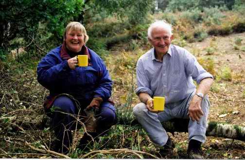 A Well Earned Coffee Break Two people drinking coffee