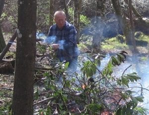 Andy Fly on bonfire duty