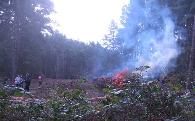 Bonfire with tractor in background